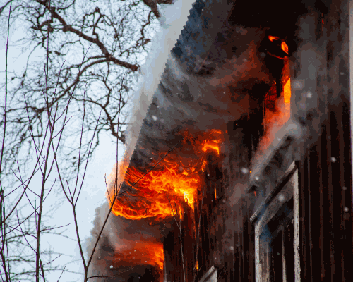 Flames and smoke from a house fire